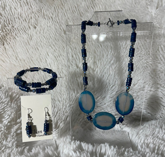 Blue Beauty Handmade jewelry set. It includes 20 inch necklace, bracelet, and earrings.